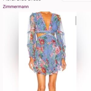 Gorgeous blue floral cut out back romper